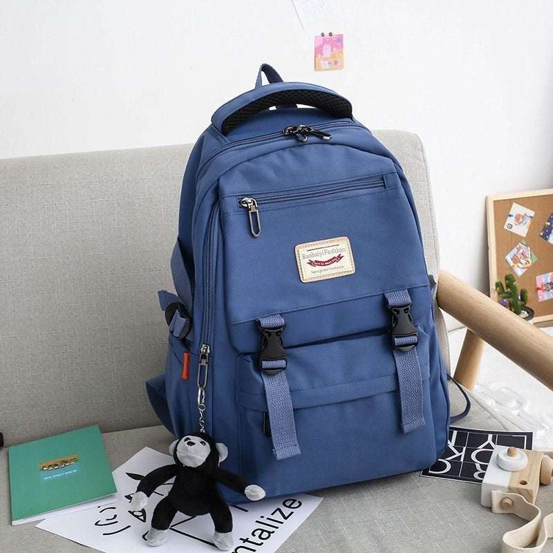Feldacks blue street style school bag backpack with multiple compartments and plush keychain