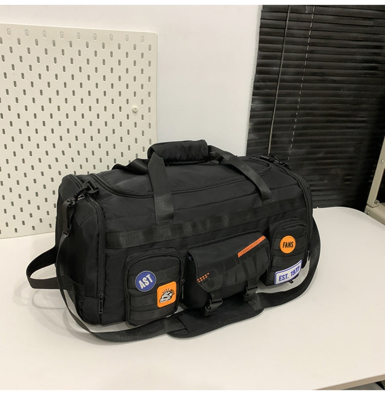 Black Feldacks outdoor sports fitness duffel bag with multiple front pockets and adjustable shoulder strap