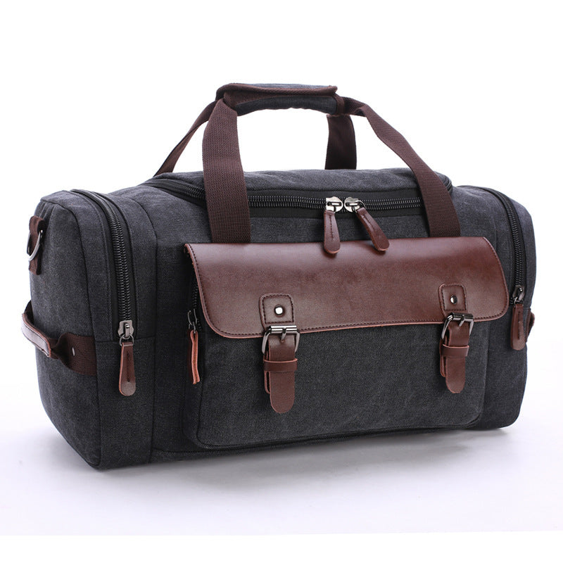 Feldacks CanvasFlex duffel bag in dark gray with brown leather accents and multiple zippered compartments