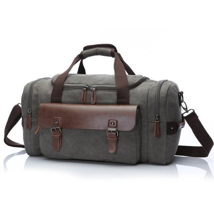 Feldacks CanvasFlex duffel bag in gray with brown leather straps and multiple zippered compartments