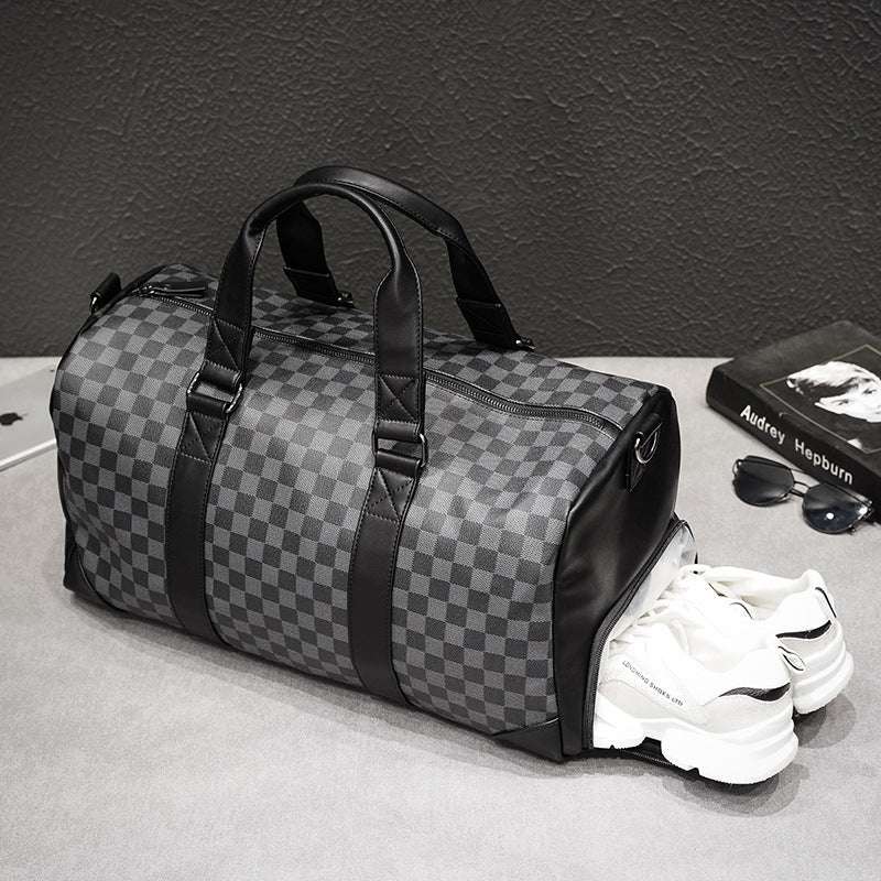 Feldacks weekend bag with shoe compartment in gray checkered pattern and black handles