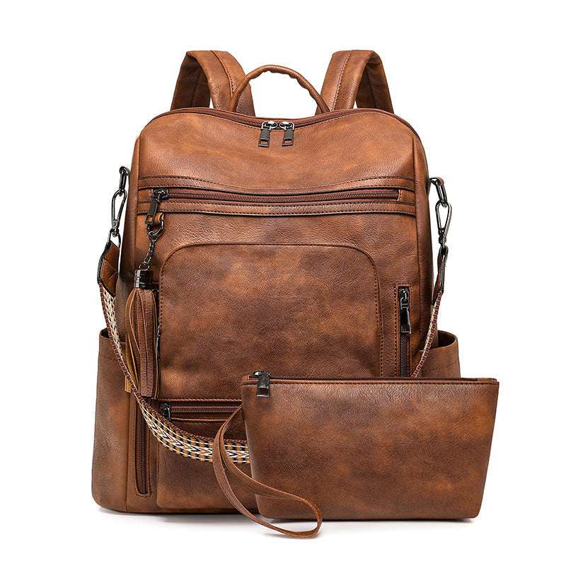 Feldacks brown contrast color fashion backpack with multiple zippered pockets and matching pouch