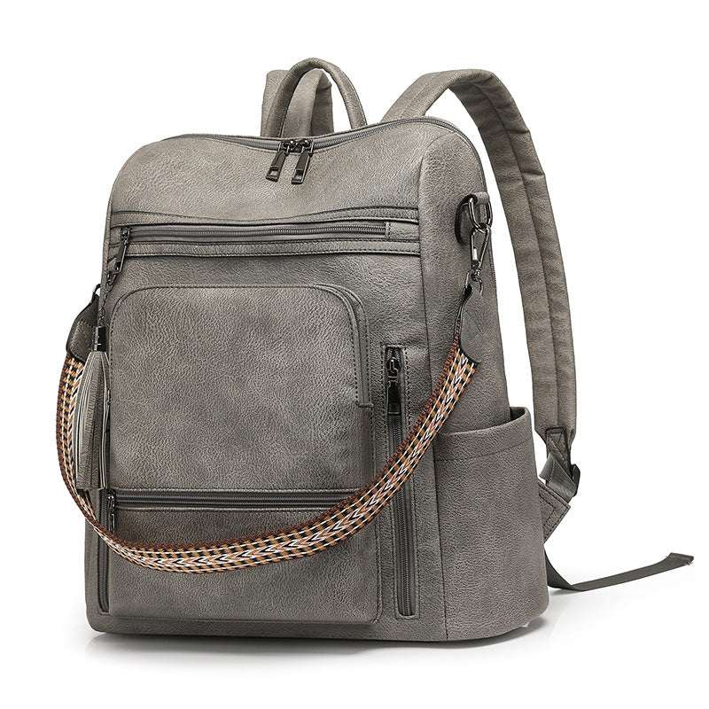 Feldacks gray contrast color fashion backpack with multiple zippered compartments and adjustable straps