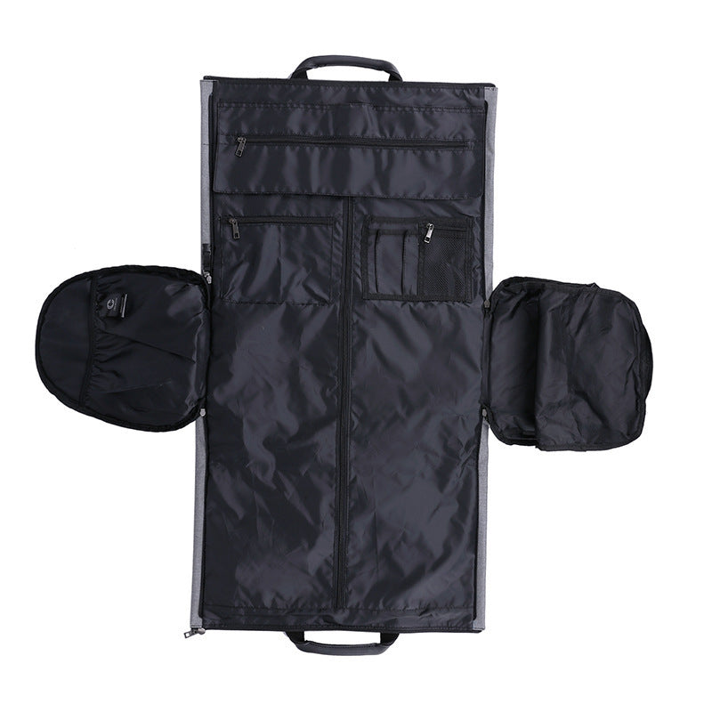 Feldacks foldable duffel bag for travel in black with multiple zippered compartments and handles