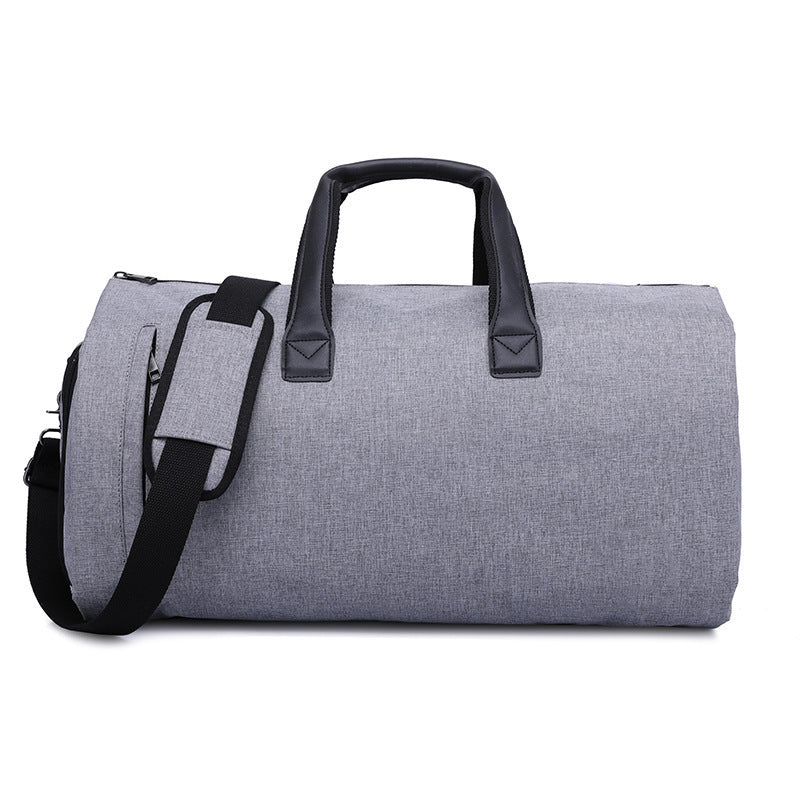 Feldacks foldable duffel bag for travel in gray with black handles and shoulder strap