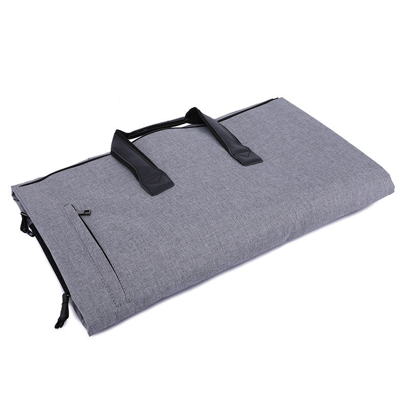 Feldacks gray foldable duffel bag for travel with black handles neatly folded flat