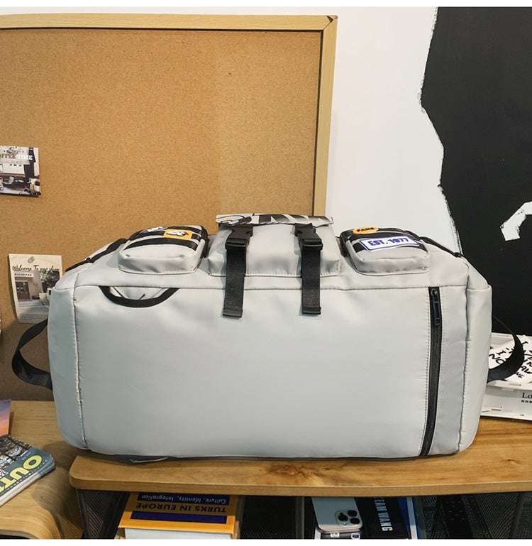 Feldacks outdoor sports fitness duffel bag in light gray with multiple compartments and black straps
