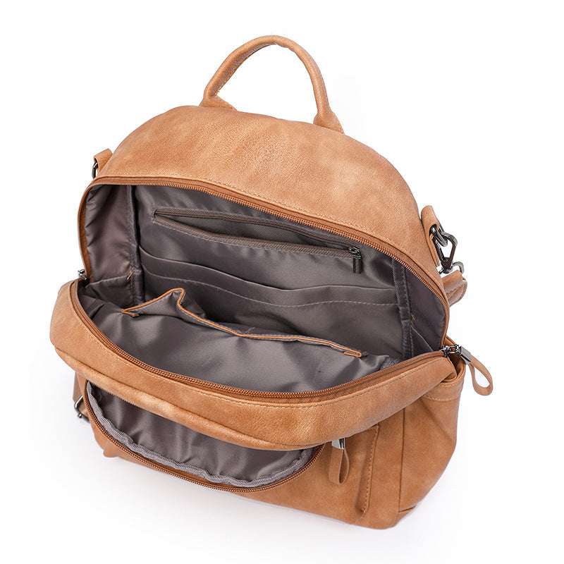 Feldacks lightweight girls backpack for travel in tan with multiple compartments and zipper closures