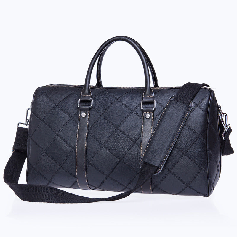 Feldacks luxury leather duffel bag for men in black quilted leather with shoulder strap and handles