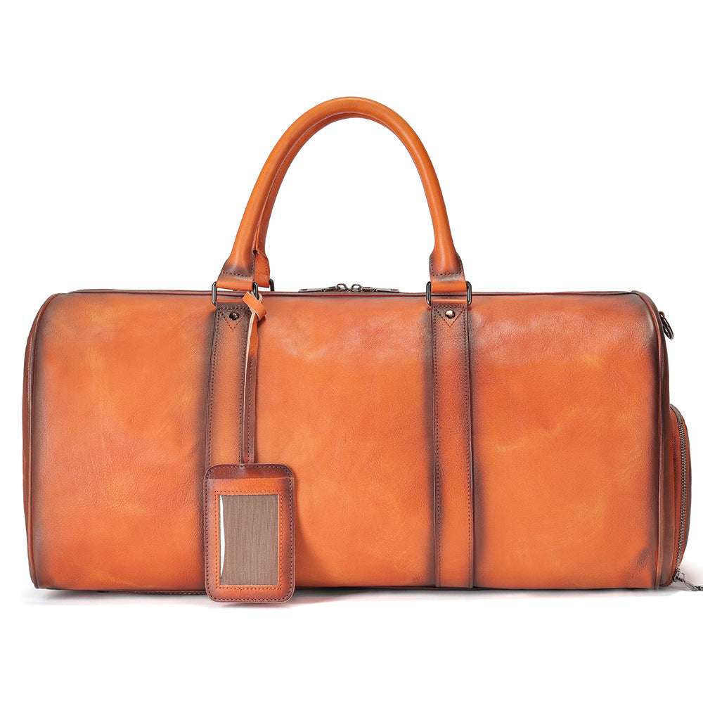 Feldacks luxury leather duffel bag for men in tan brown with sturdy handles and luggage tag