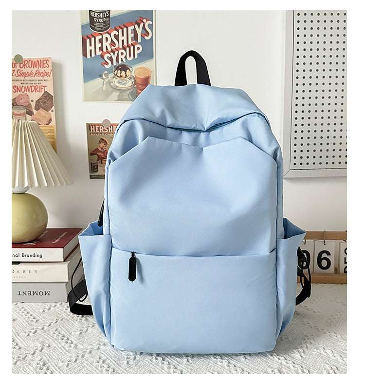 Light blue RideMate durable backpacks by Feldacks featuring multiple pockets and a simple design