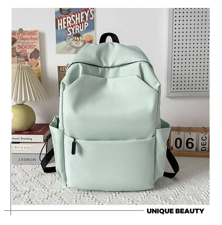 Feldacks RideMate durable backpacks in light mint green with multiple pockets and black straps