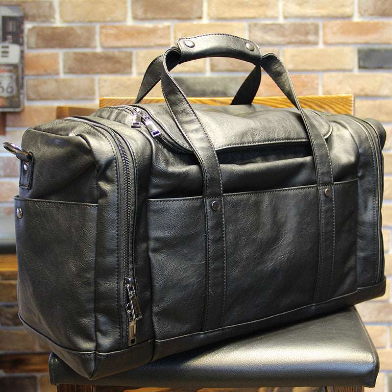 Feldacks black urban style PU leather weekend bag with dual handles and zip pockets