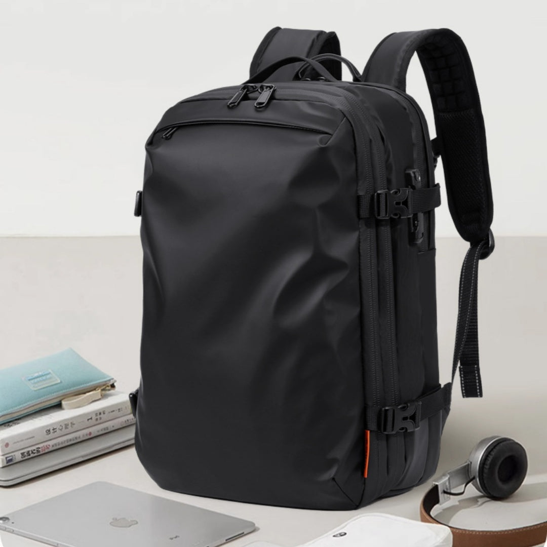 Feldacks black travel backpack with USB charging port featuring multiple compartments and padded shoulder straps