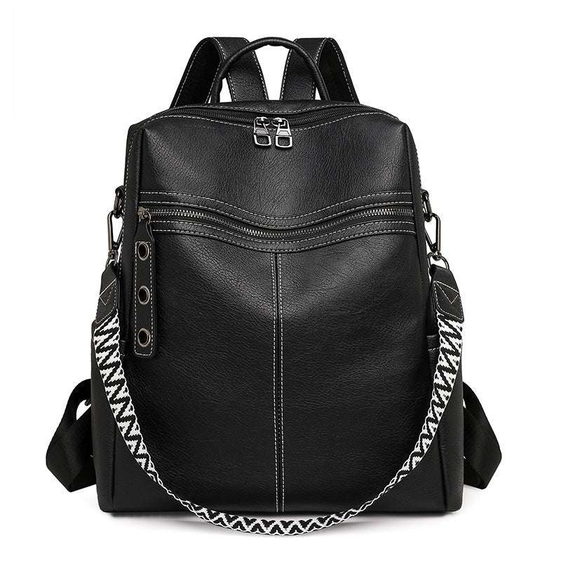 Feldacks black vintage style laptop backpack with front zipper and patterned shoulder strap