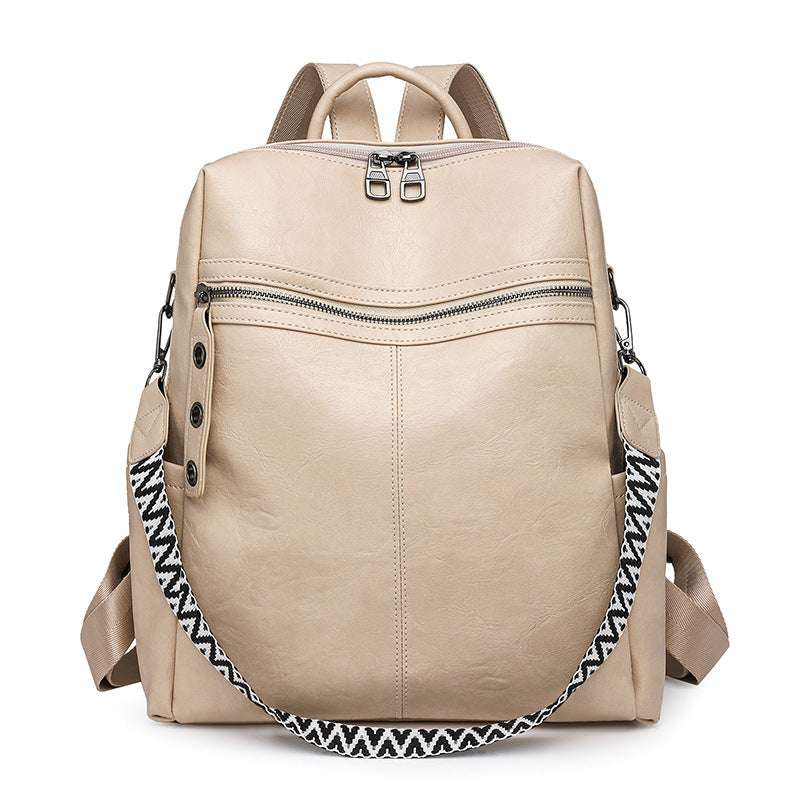 Feldacks beige vintage style laptop backpack with front zipper pocket and patterned shoulder strap