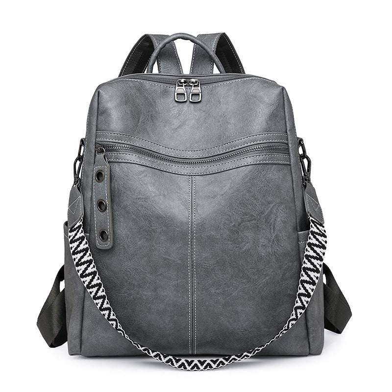Feldacks vintage style laptop backpack in gray with front zipper pocket and patterned shoulder strap