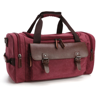 Feldacks CanvasFlex duffel bag in burgundy canvas with brown leather straps and multiple zippered compartments