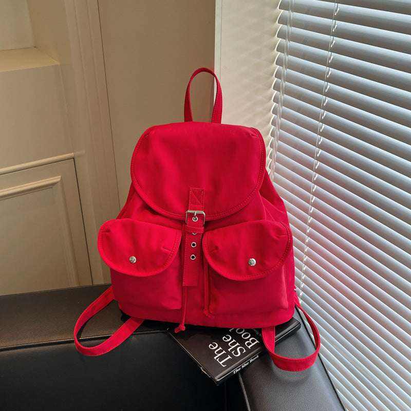Feldacks red casual all-match backpack for women with front pockets and buckle closure