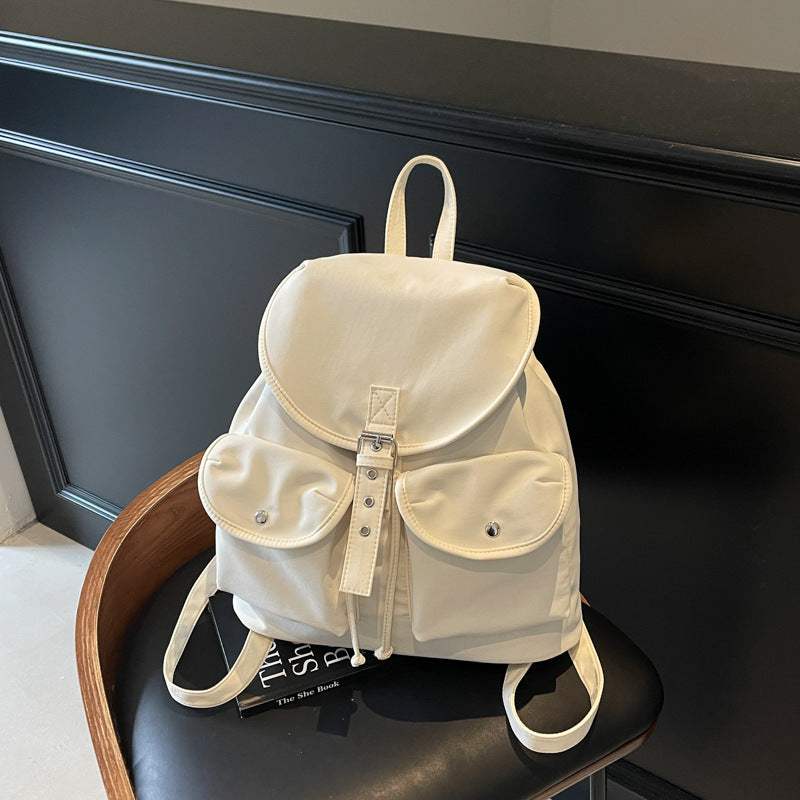 Feldacks casual all-match backpack for women in white with front pockets and adjustable straps