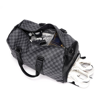 Feldacks weekend bag with shoe compartment in gray checkered pattern holding clothes and shoes