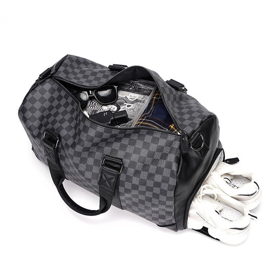 Feldacks weekend bag with shoe compartment in gray checkered pattern holding clothes and shoes