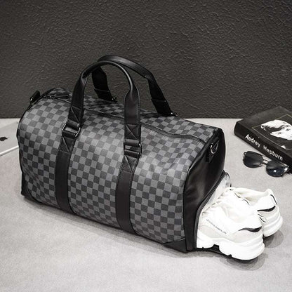 Feldacks weekend bag with shoe compartment in gray checkered pattern and black handles