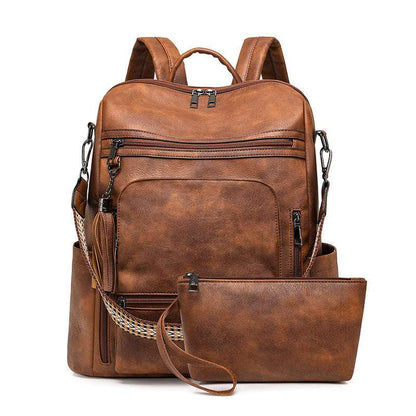 Feldacks brown contrast color fashion backpack with multiple zippered pockets and matching pouch
