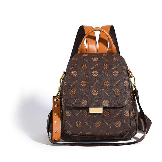 Feldacks fashionable ladies travel backpack in brown with tan straps and gold hardware