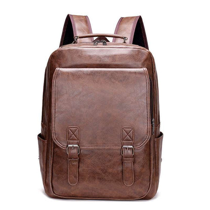 Feldacks brown leather laptop backpack for city travel with buckle straps and side pockets