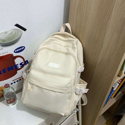 Feldacks lightweight city travel backpack in beige with multiple zippered compartments and adjustable straps