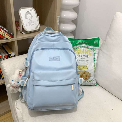 Feldacks lightweight city travel backpack in light blue with multiple compartments and side straps