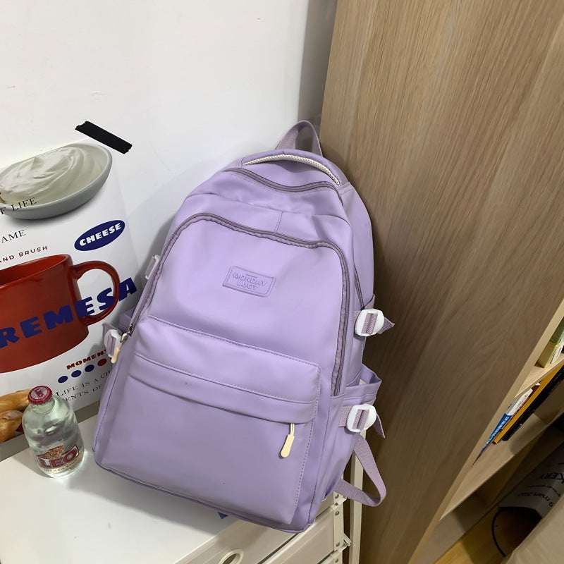 Feldacks lightweight city travel backpack in soft lavender with multiple compartments and adjustable straps