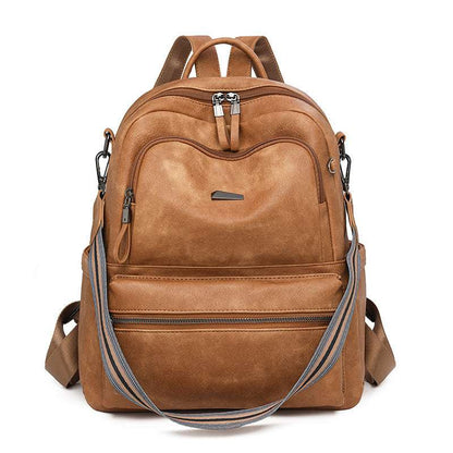 Feldacks lightweight girls backpack for travel in brown with multiple zippered compartments and adjustable straps