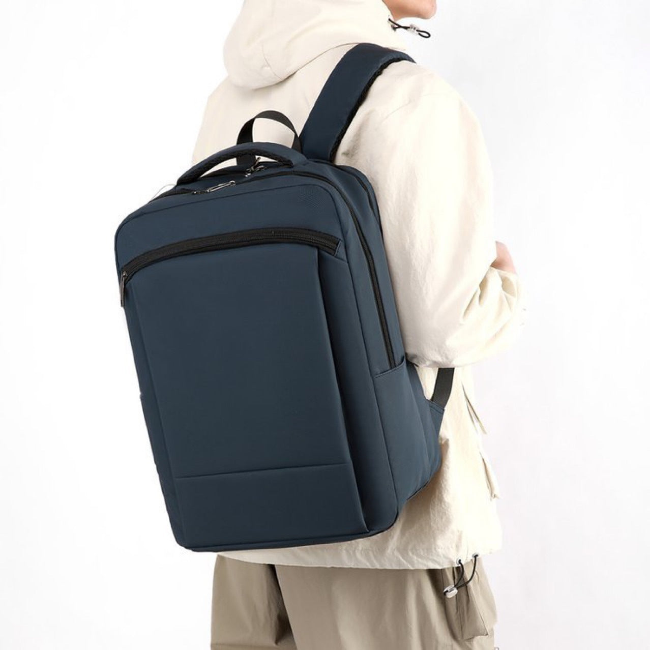 Feldacks navy professional commuter backpack for work worn on back with padded straps