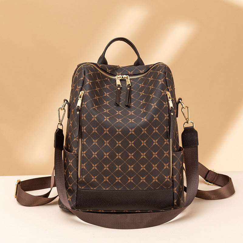Feldacks stylish anti-theft travel bag backpack in brown with gold zippers and adjustable shoulder straps