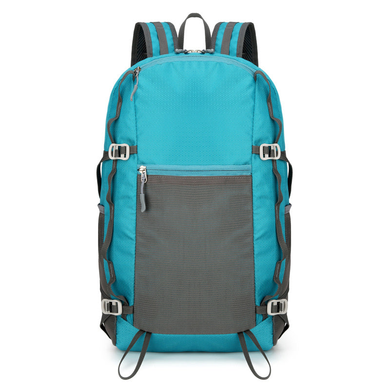 Feldacks lightweight backpack for trekking in blue with gray front pocket and adjustable straps