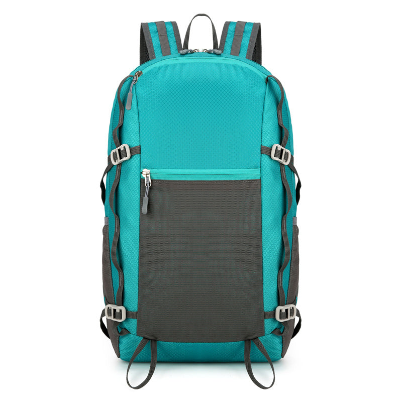 Feldacks turquoise lightweight backpack for trekking with black front pocket and adjustable straps