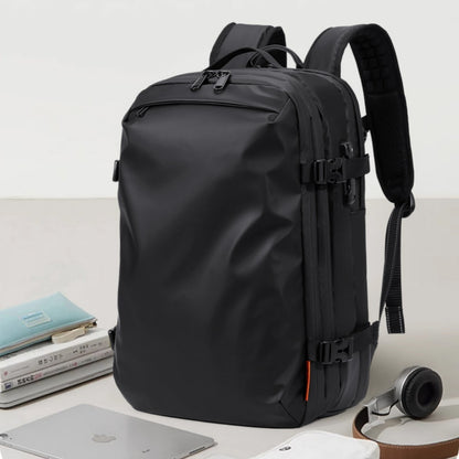 Feldacks black travel backpack with USB charging port featuring multiple compartments and padded shoulder straps