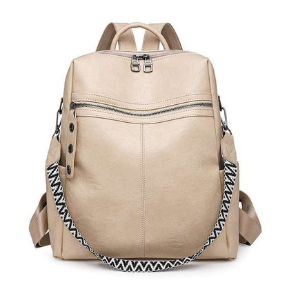 Feldacks beige vintage style laptop backpack with front zipper pocket and patterned shoulder strap